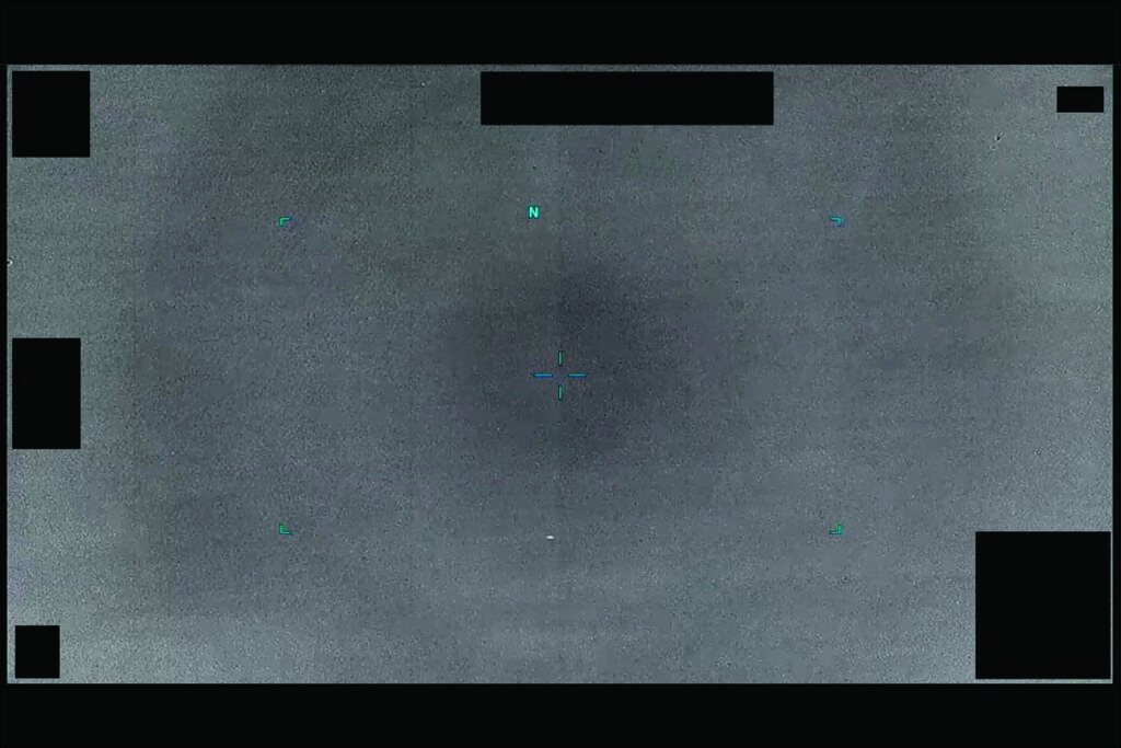 Aqua scope lines over a gray background with cloud cover — illustrative of multi-glare reports.